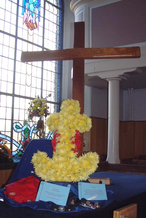 West facing window to the right of the organ