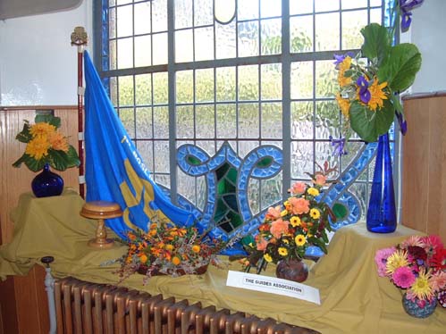 West facing window to the left of the organ